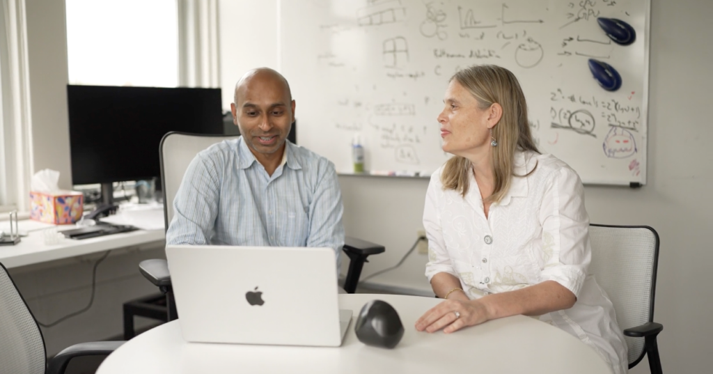 Faculty members Ramgopal Mettu and Carola Wenk discuss the MSCS program in an office setting.